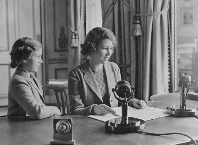 The Royal Princesses At The Microphone : A photograph of the Princesses Elizabeth and Margaret Rose at the microphone. Princess Elizabeth made her first broadcast today. October 13, 1940. (Photo by London News Agency Photos Ltd.).