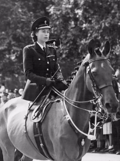Trooping The Colour Ceremony - H.R.H. Princess Elizabeth made a striking figure a she rode side-saddle in her new uniform. The annual ceremony of Trooping the Colour was held today, the official birthday of the King. The ceremony took place at the Horse Guards parade, Whitehall, London. The King was accompanied by Princess Elizabeth who rode side-saddle on her mount. June 12, 1947. (Photo by Fox Photos).