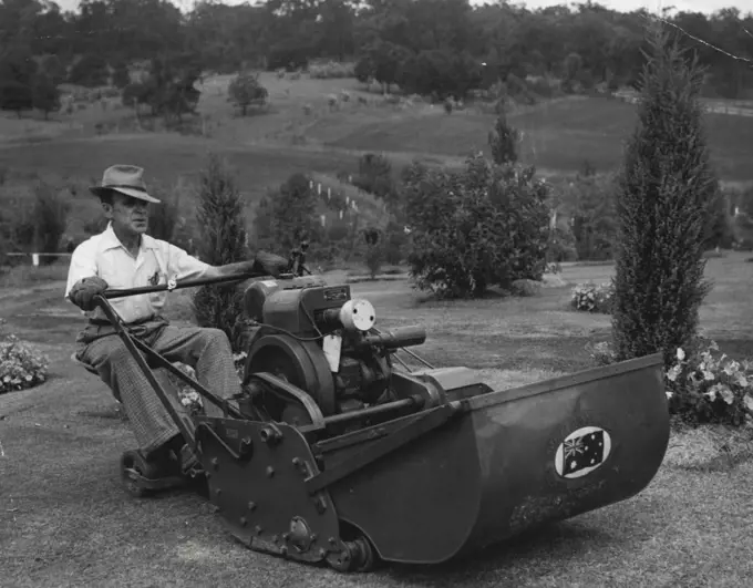They have acres of lawns and gardens at Prince's Farm. This machine mows them. November 12, 1952.