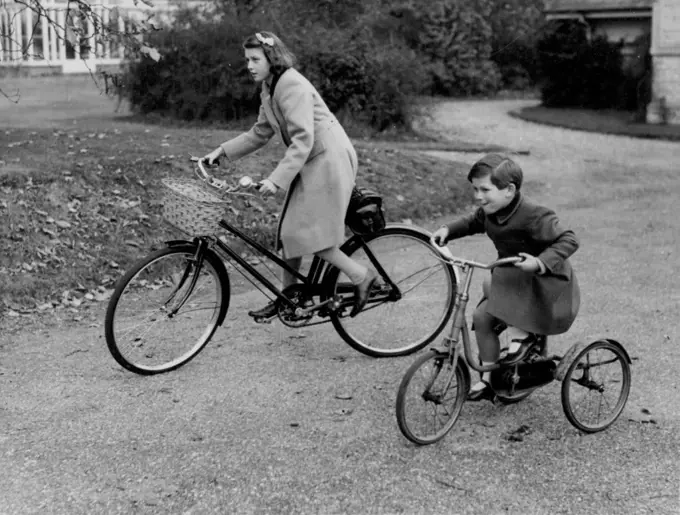 Duchess Of Kent's Children at Home -- Princess Alexandra (right) photographed with Prince Michael in the Grounds of Coppins with their cycles.
Two of the children of the Duchess of Kent were photographed at their home at "Coppins" at Iver, Buckingham. Princess Alexandra is to be one of the Bridesmaids, and Prince Michael an attendant Page, and Forthcoming marriage of Princess Elizabeth to Lieutenant Philip Mountbatten, which takes place in Westminsster abbey, London on 20th November. October 31, 1947.