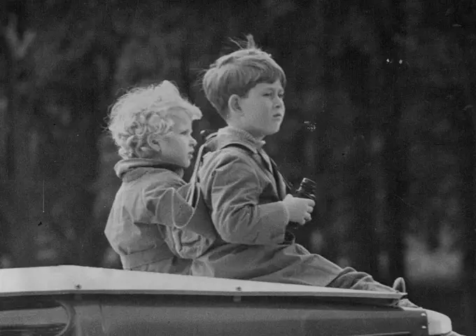 Royal Spectators At The European Horse Trials -- Two keep your spectators, perched on the roof of the Royal land rover for the best view, during the speed and Endurance That of the European Horse Trials at Windsor are 4-years-old Princess Anne and her "big" brother Prince Charles (6), equipped with binoculars.
The Royal Family have been ***** daily spectators during the four days (May 1th. to 21st) of the European Horse Trials at Windsor Great Park, in which horse seen and horsewomen of ten nations have been competing. February 28, 1955. (Photo by Fox Photos).