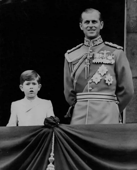 Father And Son On The Palace Balcony :H.R.H. smiles as he stands on the balcony of Buckingham Palace, accompanied by his small son, Prince Charles Duke of Cornwall, to receive the acclaim of the crowds below.After today's Trooping the Colour Ceremony to mark the Queen's official birthday, members of the Royal Family appeared on the balcony of Buckingham Palace and were given a tremendous ovation by the crowds below, who remained to cheer in spite of the rain. June 11, 1953. (Photo by Fox Photos).