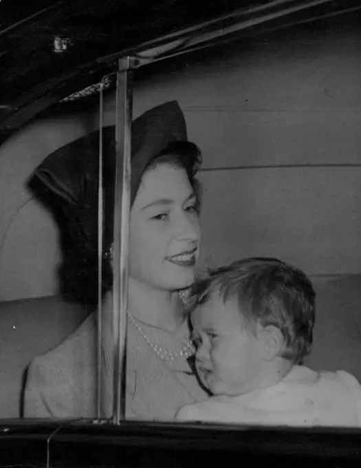 Royal Family Back In London :Princess Elizabeth carries her baby Prince Charles as the drives from Euston Station, London on her return form Scotland this morning October 10. She and other members of the Royal Family have been spending a holiday at Balmoral Castle. October 17, 1949. (Photo by Associated Press Photo).