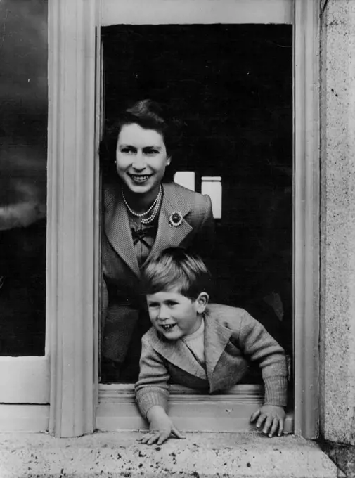 Royal Smiles. The Queen and Prince Charles taken in happy mood on the young Prince's fourth birthday at Balmoral Castle on November 14. November 23, 1952. (Photo by Camera Press Ltd.).
