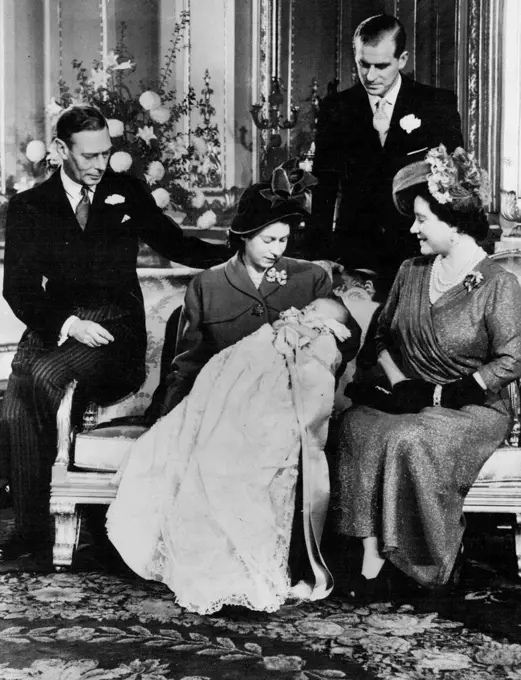 Royal Baby Christened At Buckingham Palace : First Picture of Princess Elizabeth With Son.
The first picture of the baby Prince Charles - and the King since his illness - taken at Buckingham Palace. The King is seen seated at left with the Duke of Edinburgh (Standing) Princess Elizabeth (holding baby Prince Charles) and the Queen Elizabeth. All are admiring the young Prince.
Prince Charles, baby son of Princess Elizabeth and the Duke of Edinburgh was christened at Buckingham Palace, the Archbishop of Canterbury Dr Geoffrey Fisher, officiating.
The baby was named Charles Philip Arthur George and will be known as Prince Charles of Edinburgh. December 15, 1948.