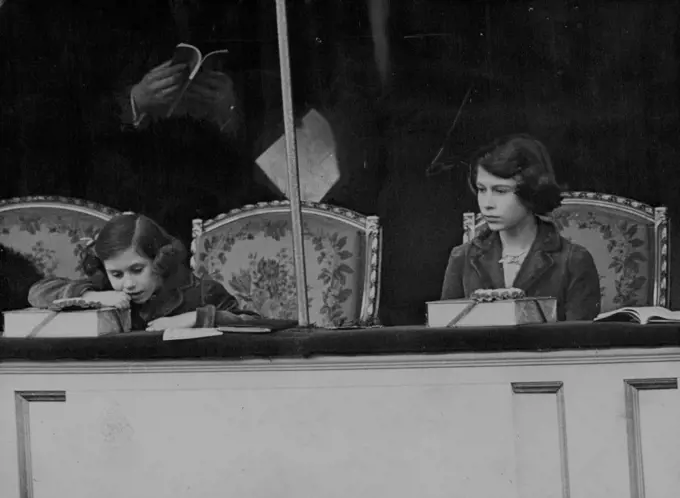 Princesses At National Pony Show -- Princess Elizabeth and Princess Margaret Rose intently watching the jumping.Princess Elizabeth and Princess Margaret Rose visited the National Pony Show at the Royal Agricultural Hall, Islington, London. March 03, 1939.