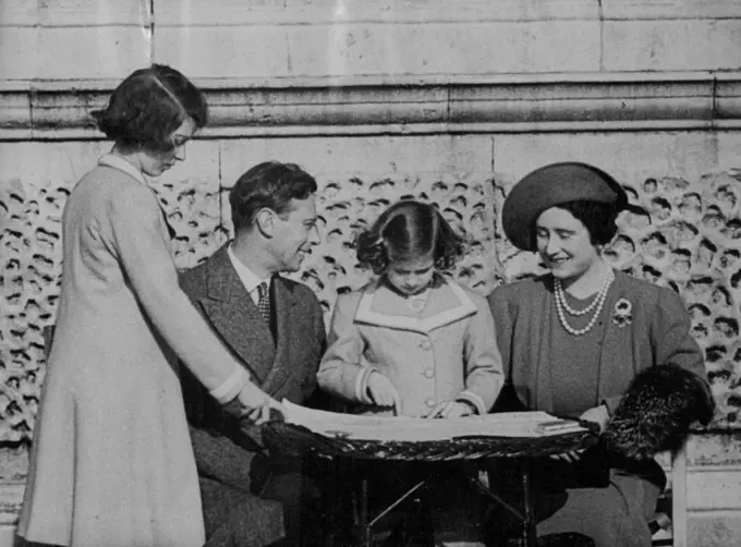 King and Queen Show Princess their Route for North American Tour - The King and Queen showing their route to Princess Elizabeth (standing) and Princess Margaret in the grounds of the Palace.Seated in the sunshine in the grounds of Buckingham Palace, with a large map spread before them, the King and Queen pointed out to Princess Elizabeth and Princess Margaret their route during the visit to Canada and America next month. April 25, 1939.