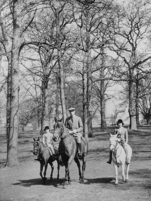 Princess Elizabeth Rides With Her Father At Windsor On Thirteenth Birthday -- Princess Elizabeth (right) riding with her father, King George, and Princess Margaret in Windsor Great Park on her thirteenth birthday.Princess Elizabeth went riding with her father, King George, and her sister, Princess Margaret, in Windsor Great Park on her thirteenth birthday. The Royal family is staying at Windsor Castle. April 21, 1939.