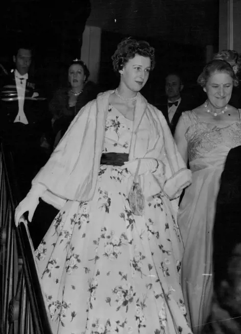Princess Alexandra at the Ball - Smilingly confident in her new Hartnell gown, Princess Alexandra arrives at Grosvenor House this evening (Wednesday) to attend the Alexandra Rose Ball with her mother, the Duchess of Kent. This is the first big public ball that the young Princess had attended. June 02, 1954. (Photo by Reuterphotos).