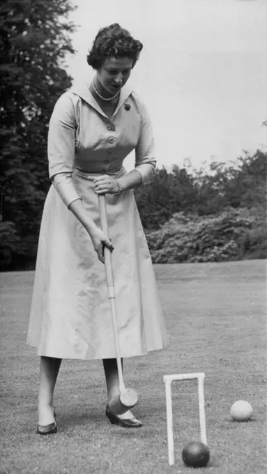 New Picture of Princess Alexandra - A new picture of Princess Alexandra, 17, daughter of the Duchess of Kent, taken today July 9. She is playing Croquet at her mother's home, Coppins, Iver, Buckinghamshire. July 16, 1954. (Photo by Associated Press Photo).