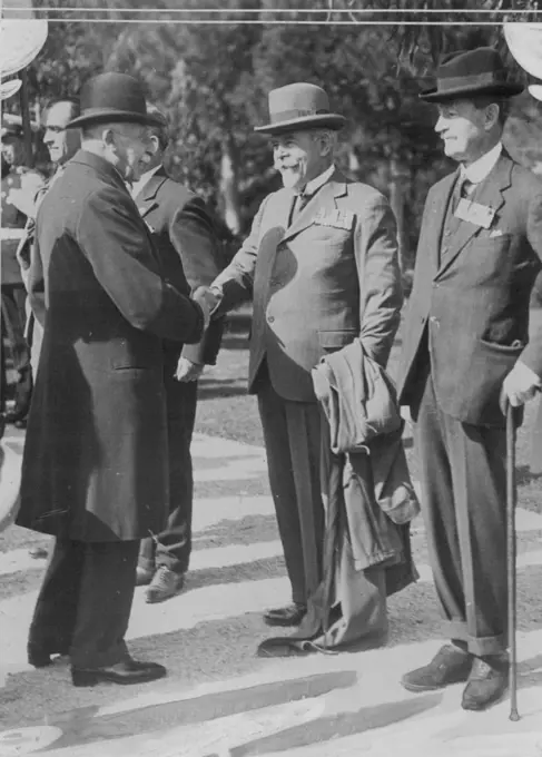 Duke Of Connaught Inspects British Legion. -- The Dukeo of Connaught, who is at present staying at his Ville at Cap Ferrat, inspecting members of the nice and Monaco branches of the British Legion in the grounds. He also inspected a detachment from H.K.S. Queen Elizabeth. H.R.H. is shaking hands with Admiral Sir Ernest Grant, a member of the Legion. May 24, 1932. (Photo by Central News)