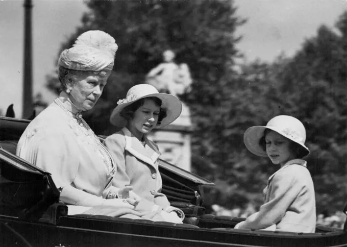 Queen Mary and Princesses Elizabeth and Margaret driving along the Hall to the Horse Guards Parade for the Trooping of the Colour. June 09, 1938. (Photo by United Press Photos).