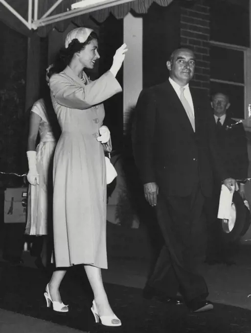 Queen and Mr. Landa leaving Central last night. February 13, 1954.