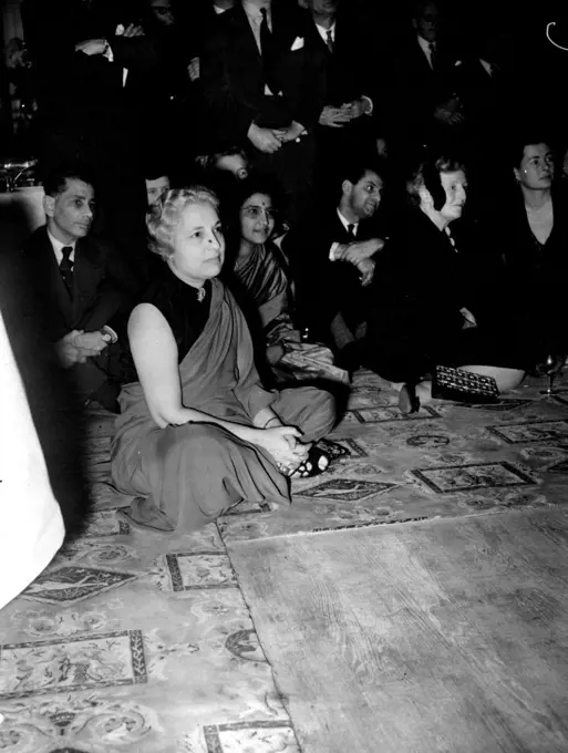 Hold Indian Party In London. 
Madame Pandit, India's High Commissioner to the U.K.
London's Dorchester Hotel was the scene of an Indian Party Thursday. Highlight of the party was a warmly-applauded exhibition of dancing by Ram Gopal. The party was given by an Indian airline company. December 30, 1955. (Photo by London Express News And Features Services).