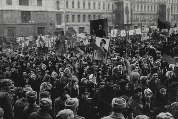 Demonstration In Moscow Nov.7, 1945. -- Moscowites carry portraits of Lenin, Stalin and leaders of the Soviet State. October 20, 1950 (Photo by J. Khalip, SIB Photo Service).