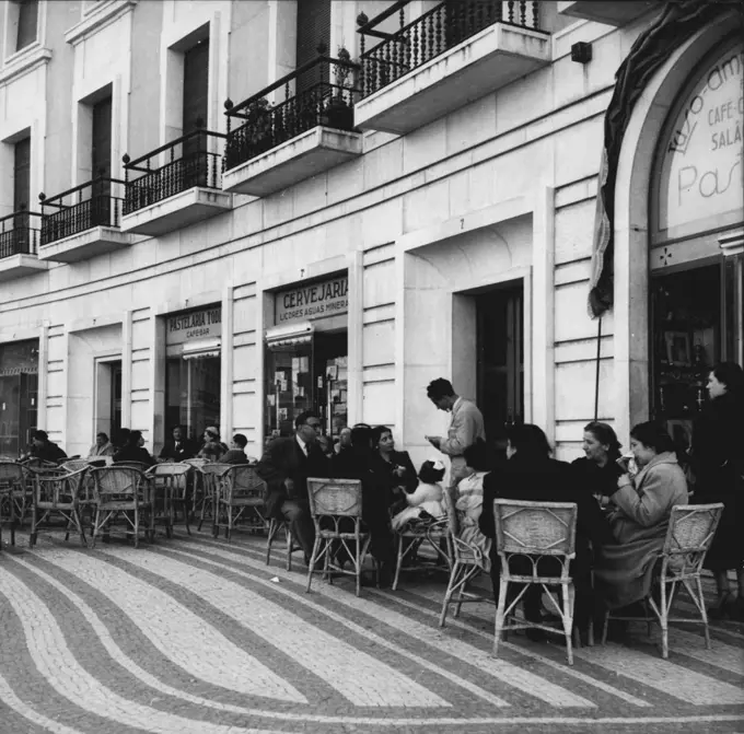 Lisbon 1952 -- Busy Cafes line the streets of Lisbon's new quarter. February 27, 1952. (Photo by Camera Press).