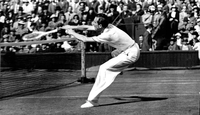 Perry Goes To The Net
A Characteristic action picture of Fred. Perry, rushing the net, during the Wimbledon championships. July 18, 1936.