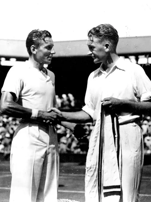 Perry Wins Men's Singles Championship At Wimbledon.
Jack Grawford (Australia) congratulating Fred Perry on winning the men's Singles tennis championship at Wimbledon today. This is the first time since 1909 that an ***** has won the championship. July 06, 1934. (Photo by Keystone).
