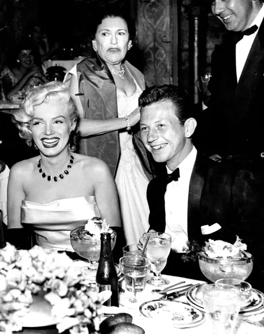 Marilyn Monroe, Louella Parsons, Donald O'Connor at Coconut Grove. October 21, 1953.