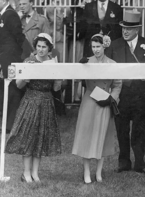The Queen with Lord Rosebery and Princess Elizabeth, daughter of Prince Paul and Princess Olga, of Yugoslavia, watching the Derby which was won by Phil Drake. June 02, 1955.
