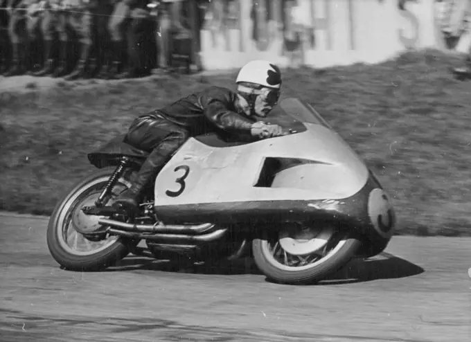 Duke Does it Again - Reg Armstrong of Australia piloted his Gilera to third place in the 500 C.C. Race at Hockenheim, behind Geoff Duke and Ken Kavanagh.Geoff Duke, Britain's World 500 CC Motorcycle Champion Robe his 500 CC Gilera to victory in the Rhine cup races at Hockenheim, Germany on Sunday.More than 120,000 fans saw him set up a lap record of 123.83 miles an hour. He covered the 20 laps in 47 minutes 12.5 seconds.Ken Kavanagh of Australia was second in this event and also won the 350 CC Race on his Moto-Gizzi at 111.84 miles an hour. May 10, 1955. (Photo by Paul Popper).