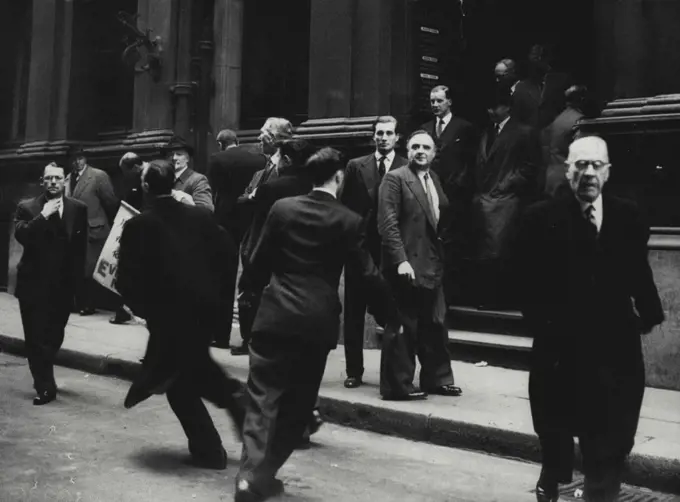 Bank Rate Soars - Brokers rush from the stock exchange after the Bank Rate was raised to 5½ percent today, February 16 - the highest it has been since 1931. The bank rate was raised from 3 to 3½ percent on January 27, 1955; then raised to 4½ percent on February 24 1955. It was now been raised from 4½ percent. February 23, 1955. (Photo by Associated Press Photo).
