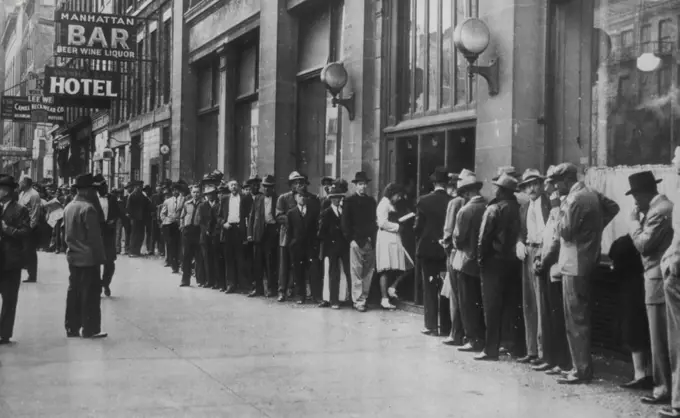 Crowd Lines Walk at Employment Office -- A block long line formed in front of the U.S. employment office here today waiting for interviews. Strikes and plant closing have made more than 80,000 persons idle in the Detroit industrial area. September 17, 1945. (Photo by AP Wirephoto).