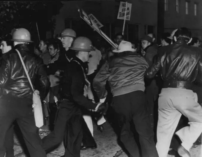 Non-Strikers Crash Picket Line -- This brief flurry of action broke out at Columbia Studio today as several non-strikers attempted to crash the massed picket line posted by the striking Conference of studio unions. Police began arresting the pickets shortly afterwards. November 15, 1946. (Photo by AP Wirephoto).
