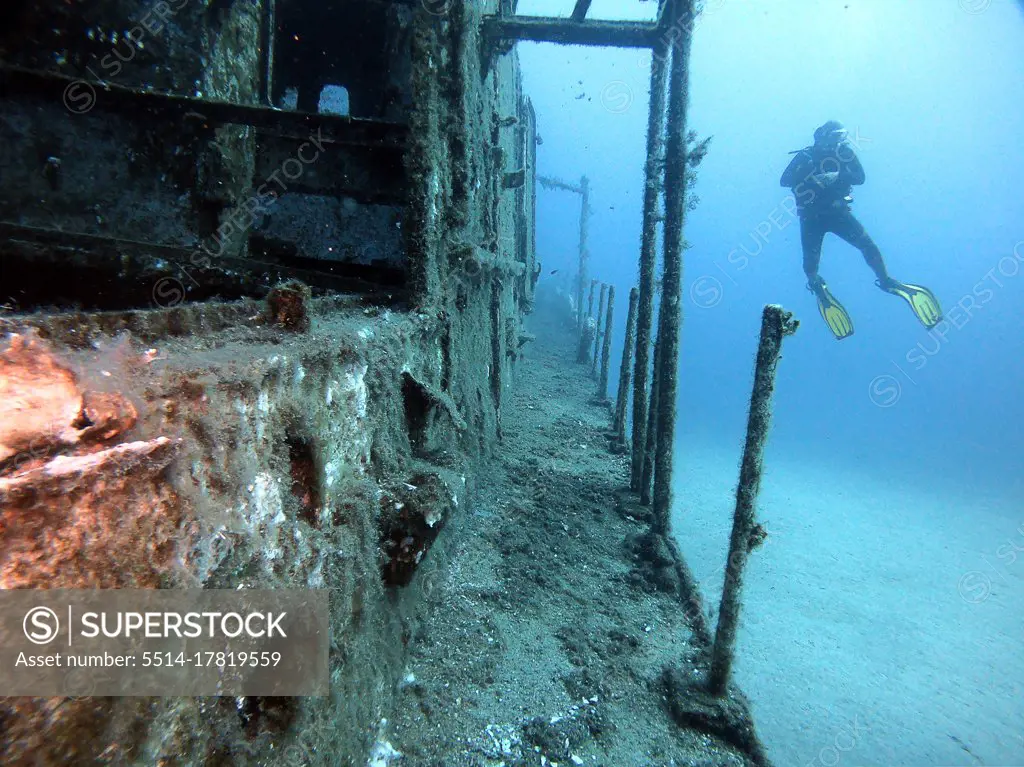 A diver dives next to the wreck.Antalya Turkey KaÅŸ
