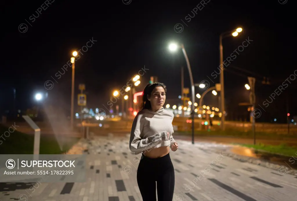 Positive fit female jogging at night