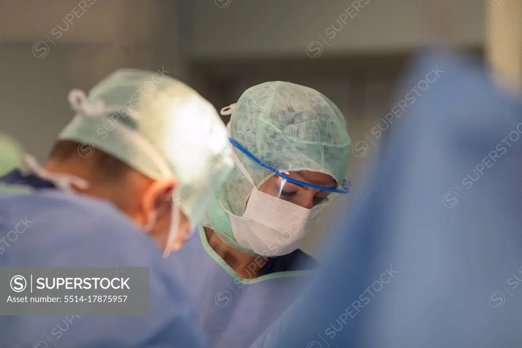 face of a surgeon in the operating room