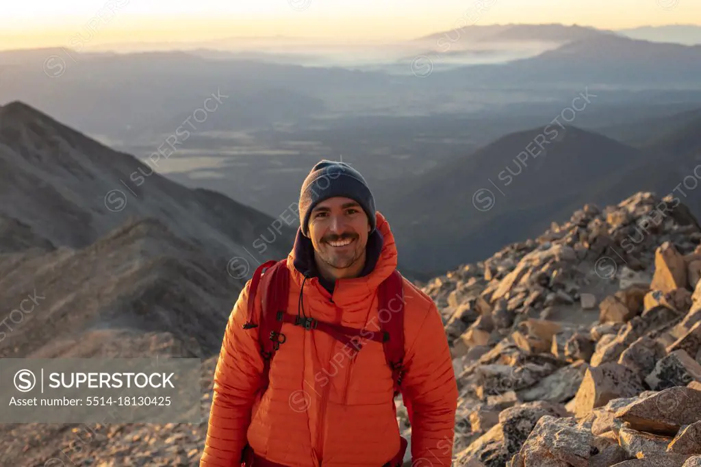 Portrait of smiling male hiking during vacation
