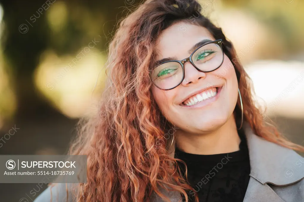 Cuban Latin Woman With Glasses Outdoors