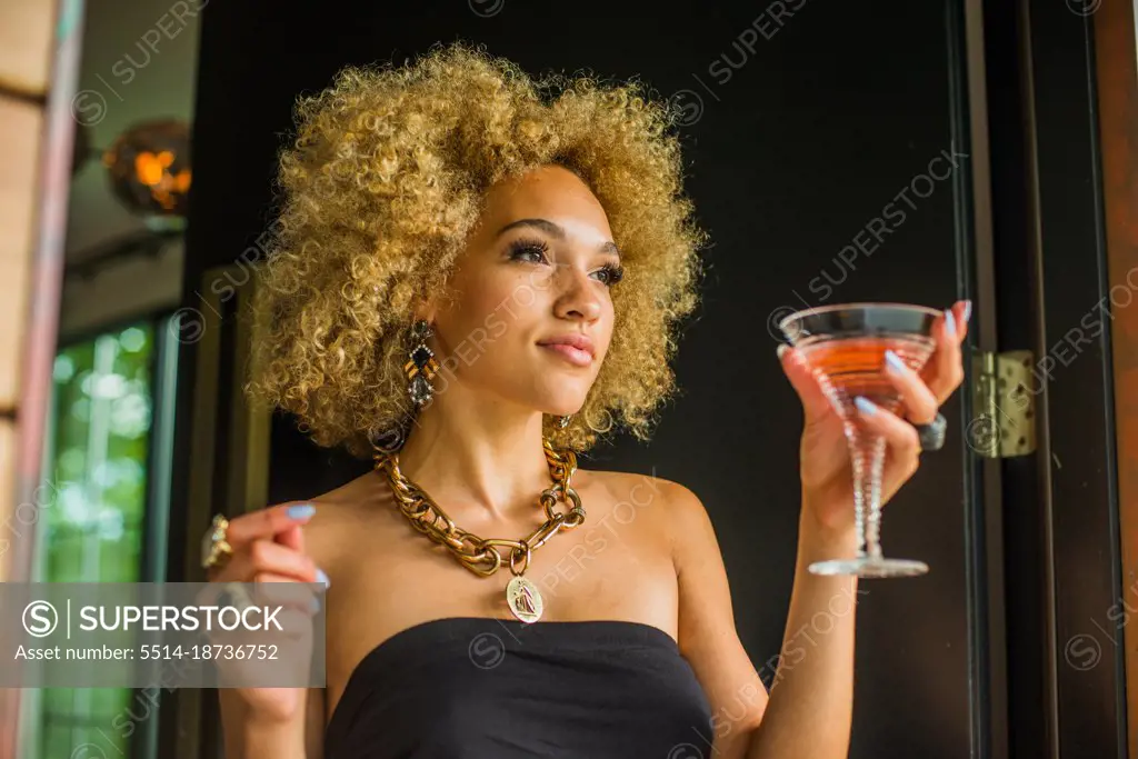 Welcoming you with a cocktail at the front door