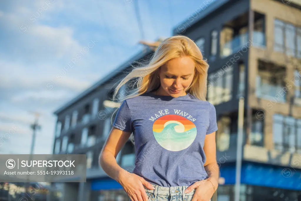 Blond haired woman in Kindness Tshirt