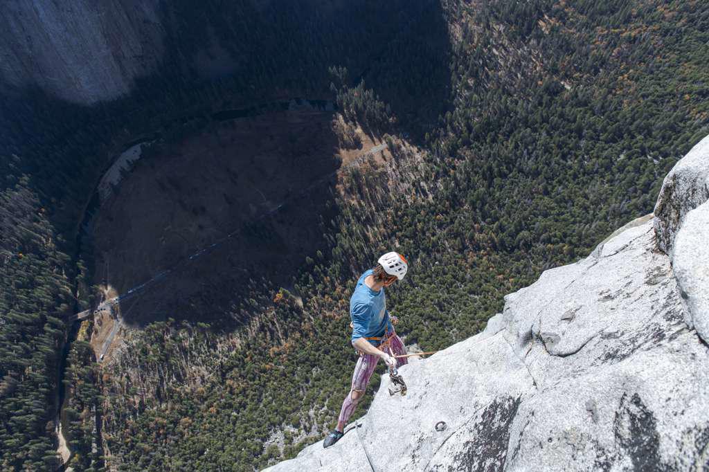 Climber looking down after climbing the nose on el capitan from top