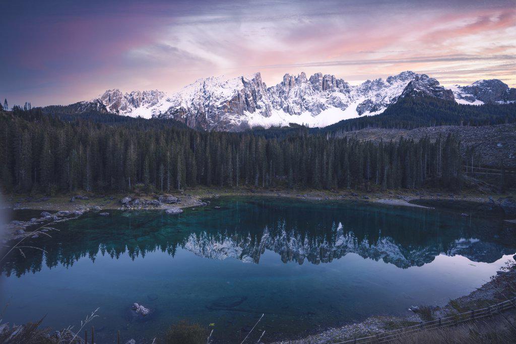 Landscape shot of Lago di Carezza in front of Latemar at sunset