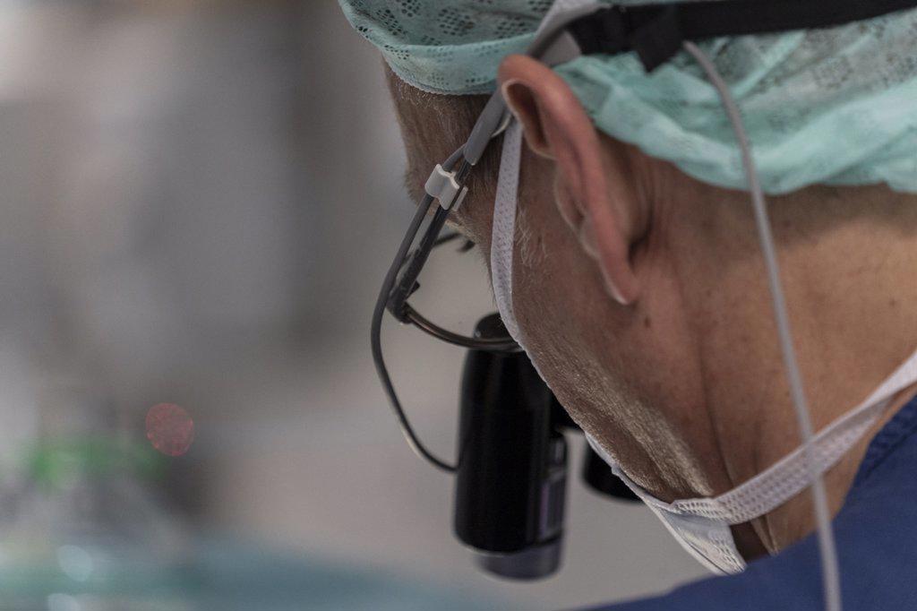 close up view of surgeon wearing loupes