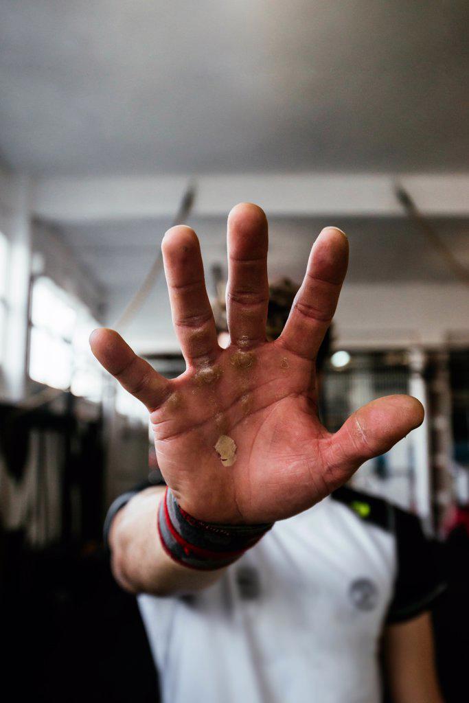 Athlete man's hand after intense training