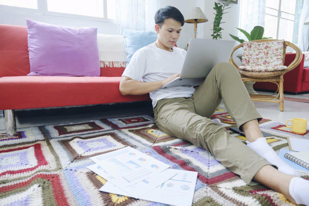 Young man online working and learning from home