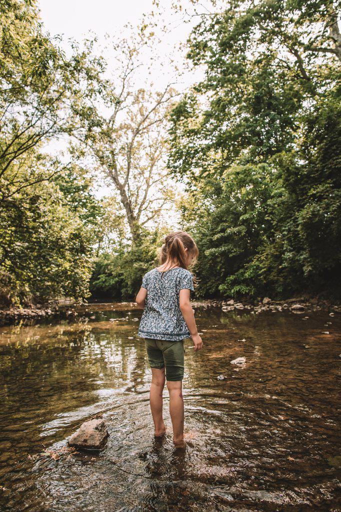 playing in the creek in the summer