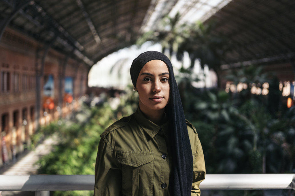 Bussiness muslim woman on a train station