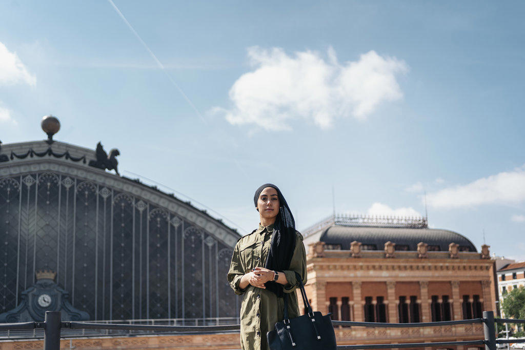 Modern Muslim woman on the city