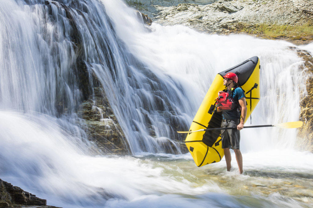 Outdoor adventure portrait, river rafting scenic, British Columbia