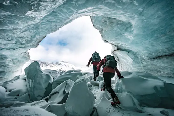 Mountaineers Exploring Inside Of Glaciers In Jasper