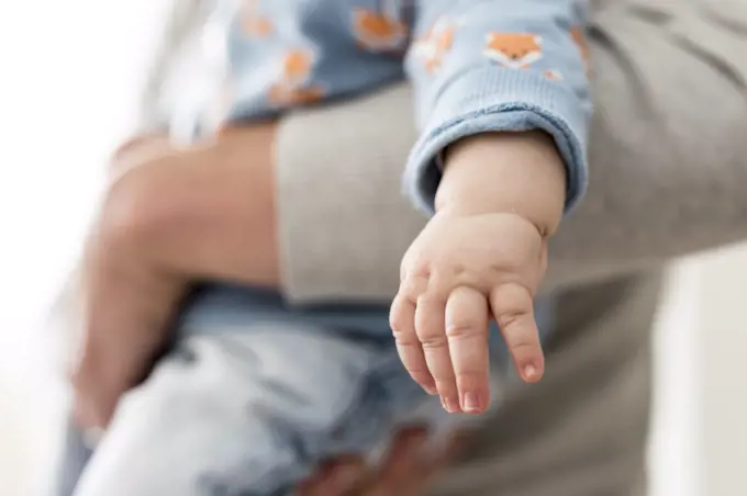 close up view of a chubby child's hand