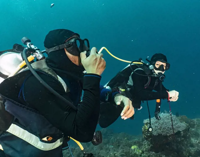 divers sharing air in emergency training in Raja Ampat / Indonesia