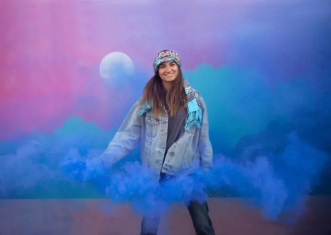 Happy Fun Girl With Smoke Bomb In Front Of Street Art