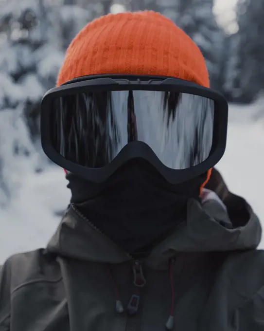 Snowboarder portrait with orange cap