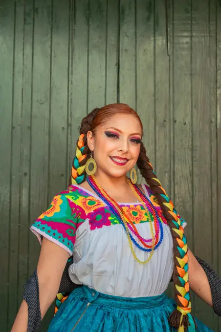 Mexican woman with folk costume for traditional dance